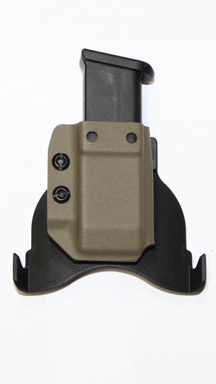 REVKEL Ambidextrous magazine carrier. Paddle mount